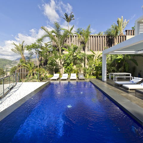 Enjoy a lush dip in the private outdoor pool or chill out on a poolside lounger