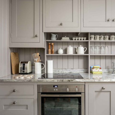 Whip up a delicious dinner in the country-style kitchen