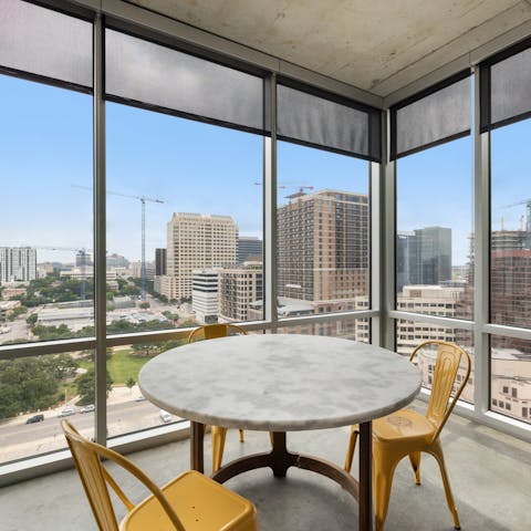 Watch the city wake up over breakfast