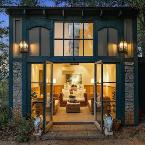 Take some private time in the impressive garden room – you can even watch movies on its huge TV