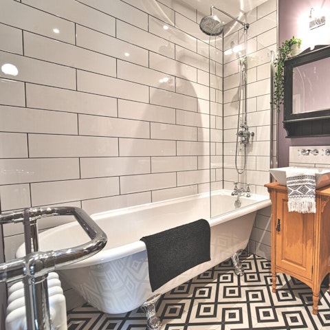 Soak in the bathtub after a day of sightseeing