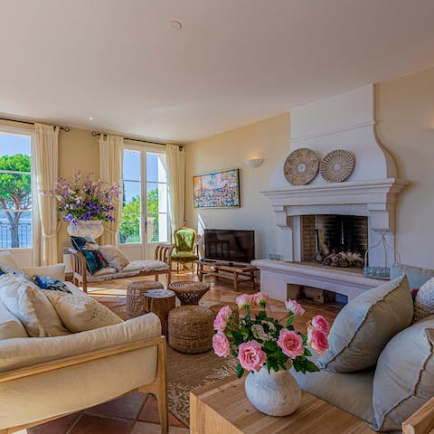Embrace the old world with the big stone fireplace in the living room