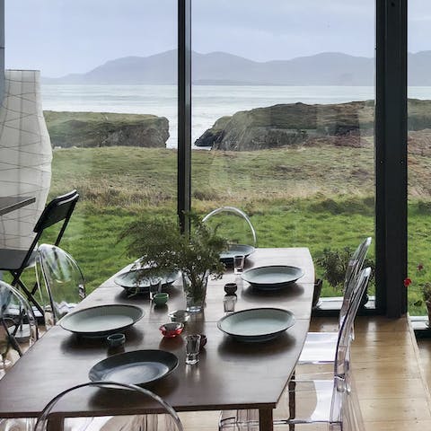 Share delicious family meals at one of the dining tables while admiring the sweeping views outside