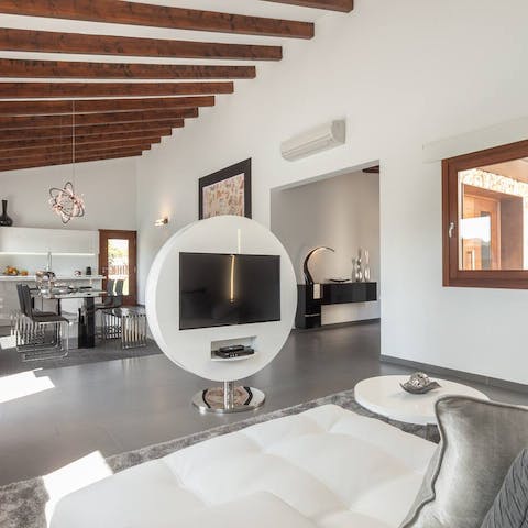 Unwind in the living room with a show on the flatscreen TV