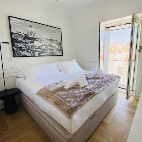 Open the French doors to the Juliet balcony and listen to the sounds of Lisbon