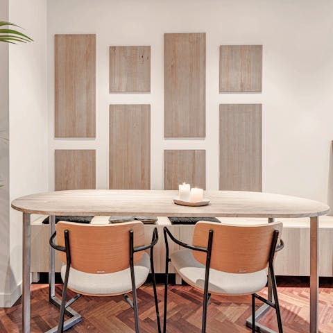 Sit down to an elegant meal at the chic dining table