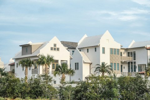 Admire Alys Beach's striking whitewashed Bahamian-inspired architecture and pools, just nine minutes on foot