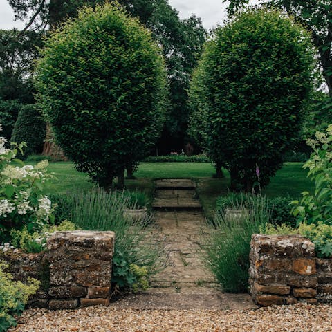 Explore the ten acres of grounds that surround this home and bump into the free range bantam chickens