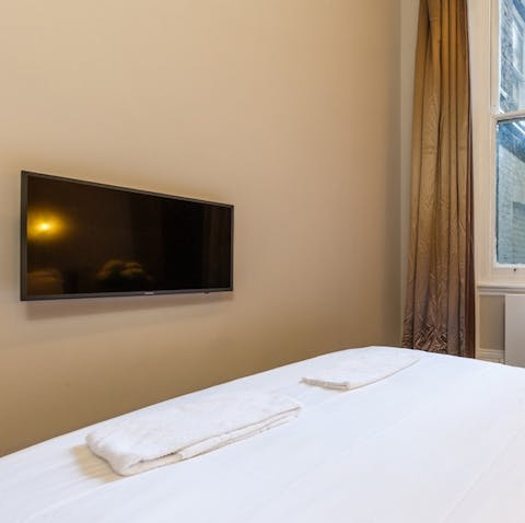 Enjoy some TV in bed