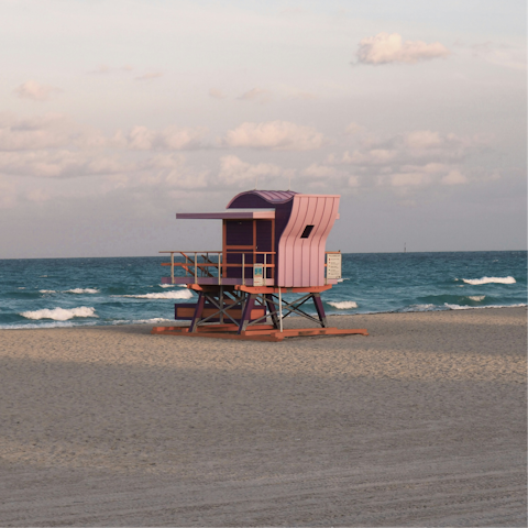 Soak up the sun while strolling along Miami Beach