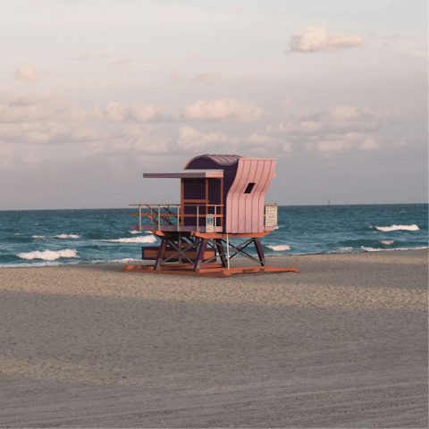 Soak up the sun while strolling along Miami Beach