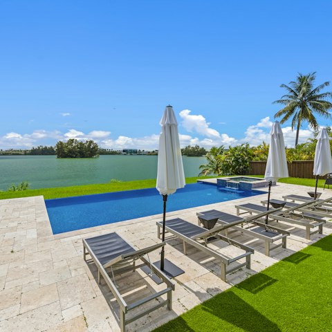 Find peace and relaxation while lounging by the pool