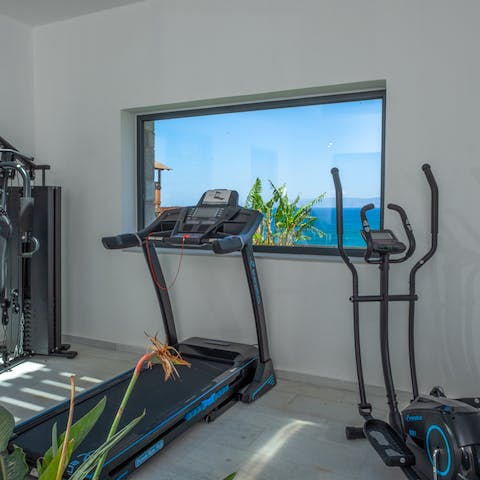 Start your day off right with a workout in the home gym, including magnificent views