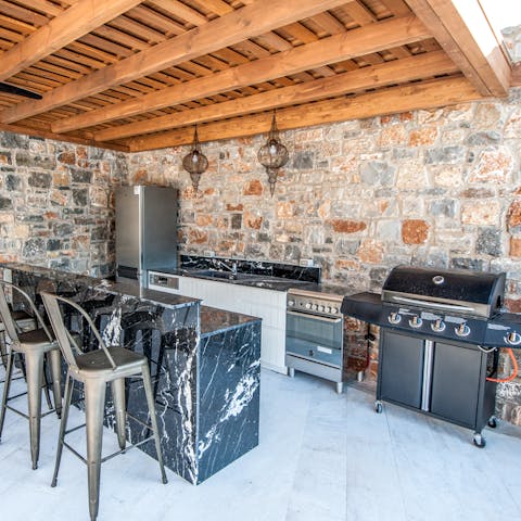 Create special memories cooking for friends and family in the outdoor kitchen – vista views included