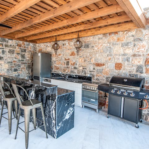 Create special memories cooking for friends and family in the outdoor kitchen – vista views included