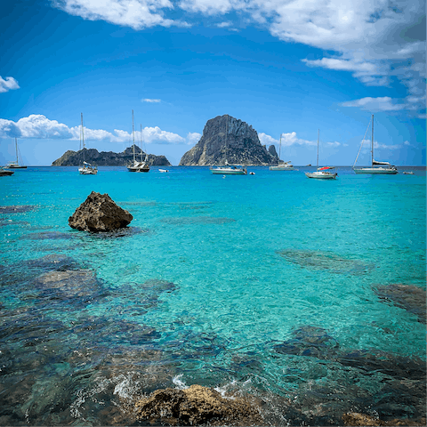 Take the ferry over to experience the party and postcard views of Ibiza