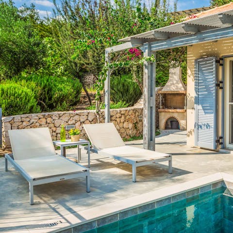 Lie back on a sun lounger and catch some rays