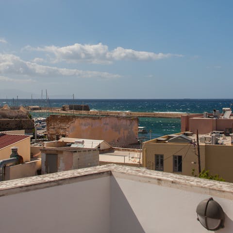 Admire the sea view from the large rooftop terrace