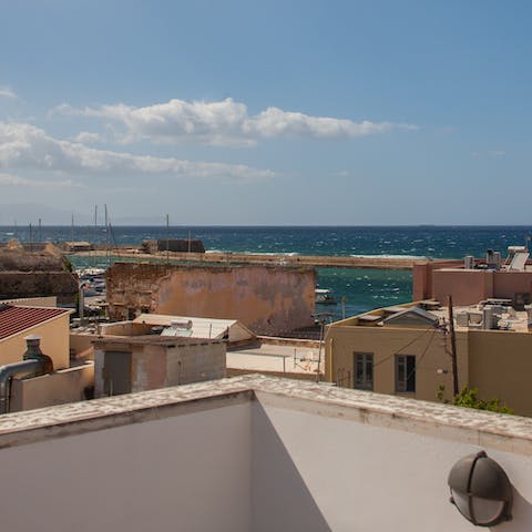 Admire the sea view from the large rooftop terrace