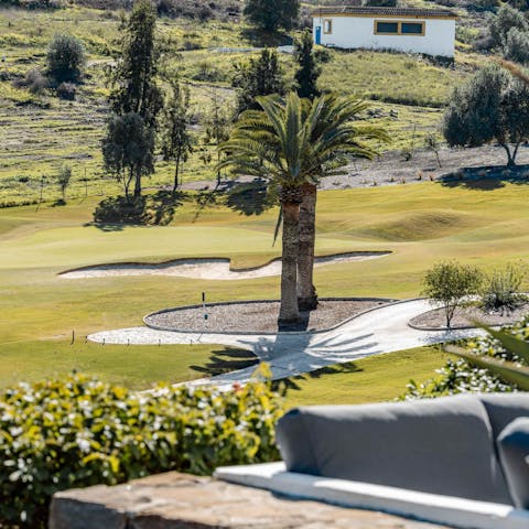 Admire views of the fairway from the private garden
