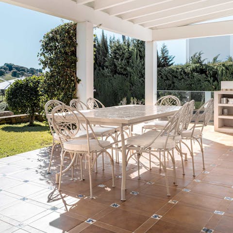 Enjoy an alfresco meal overlooking the golf course
