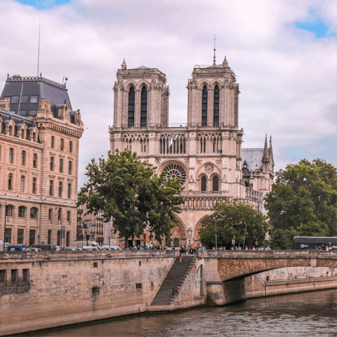 Cross the Seine and visit Notre Dame, fifteen minutes on foot