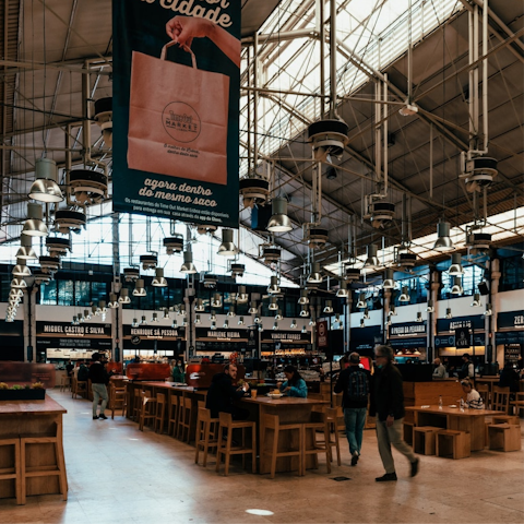 Grab tapas at the nearby Mercado da Ribeira food hall