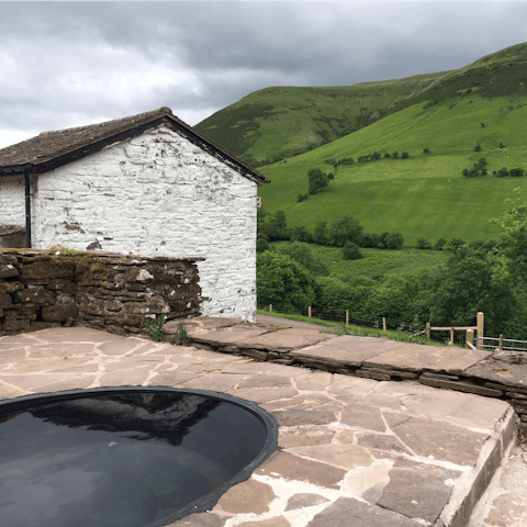 Get some R&R in the mountain spring water hot tub