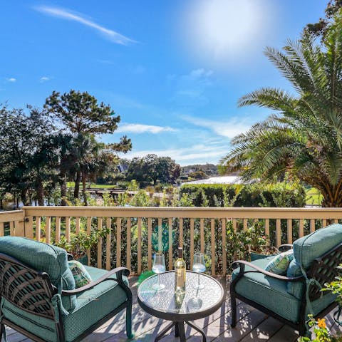 Enjoy evening drinks on the deck overlooking the golf course