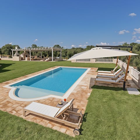 Splash around in the pool or sunbathe with a good book