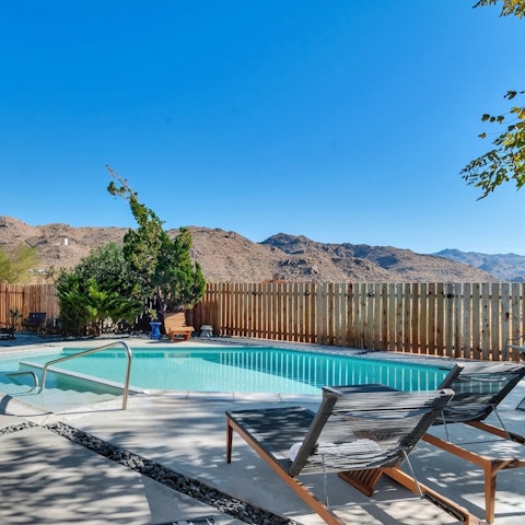 Take a dip in the mountain-view pool