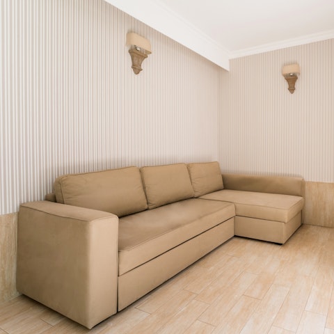 Relax on the sofa overlooking the garden at the end of a busy day