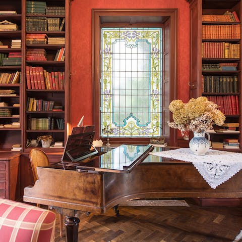 Tinkle away on the grand piano in the old library filled with leather bound books