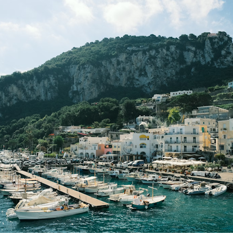 Explore the vibrant marinas of Capri, a five-minute drive away