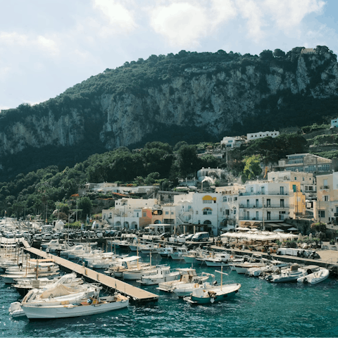 Explore the vibrant marinas of Capri, a five-minute drive away