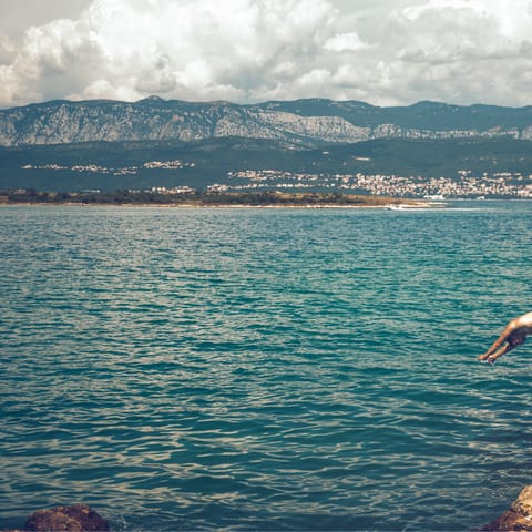 Head to the beautiful coast of Krk Island, a ten-minute drive away
