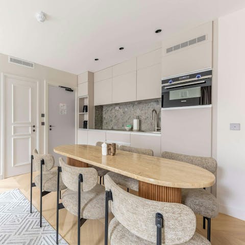 Nibble on croissants around the sleek table