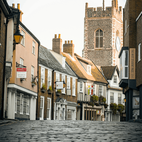 Stroll along Norwich's cobbled lanes towards the cathedral