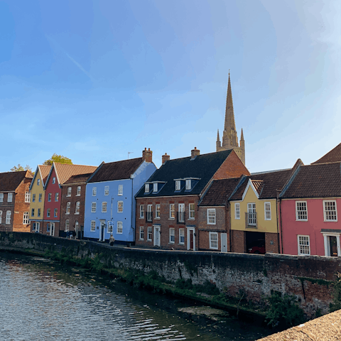 Stay along the River Wensum, opposite Fye Bridge