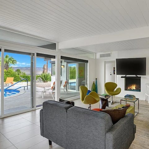 Effortlessly step from the living room to the pool