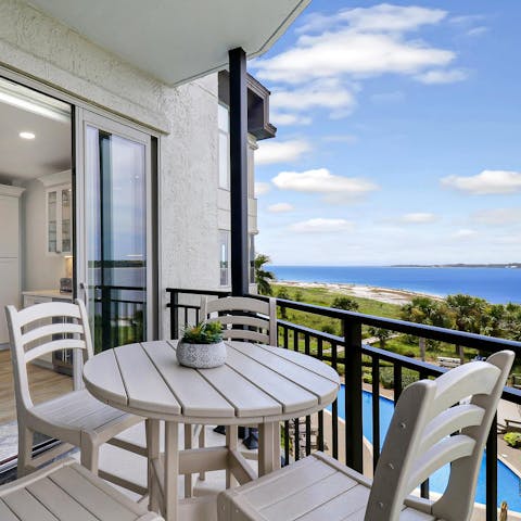 Savour the seaside scenery from your spot on the balcony