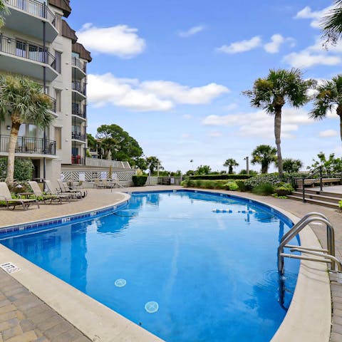 Enjoy a swim in the shared pool, or relax at the poolside