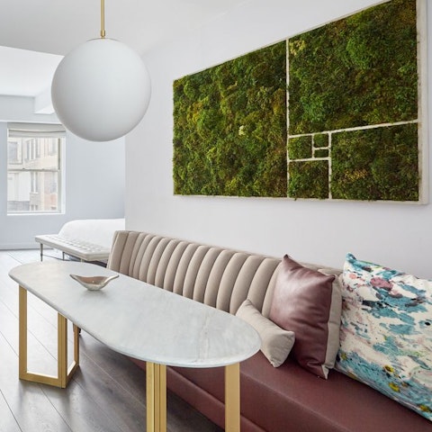 Admire the reindeer moss wall art above the dining nook