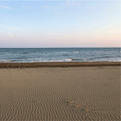 Sink your toes in the sand at Plage des Fourmis, five-minute walk away