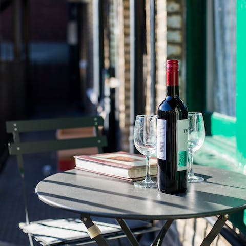 Enjoy a drink on the balcony