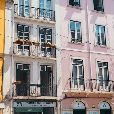 Explore the pastel-coloured streets of Bairro Alto