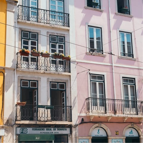 Explore the pastel-coloured streets of Bairro Alto