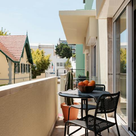 Step onto the balcony and feel connected to the heart of the city
