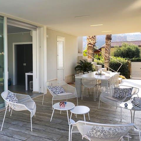 Dine alfresco or gather on the terrace for evening drinks by the pool