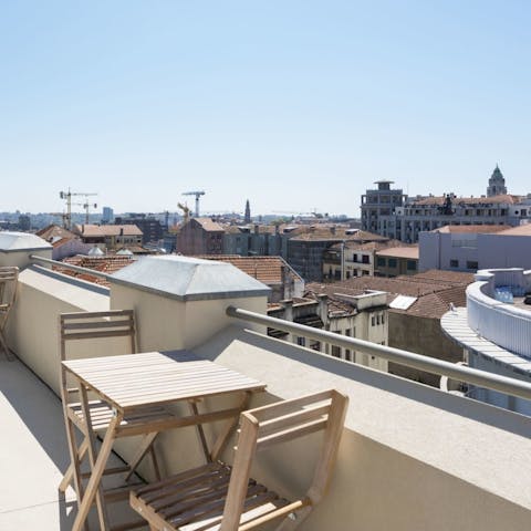 Step onto the balcony and feel serenaded by sweeping city views